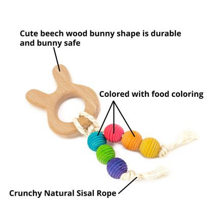 Wooden bunny-shaped chew toy with colorful beads and natural sisal rope on a white background.