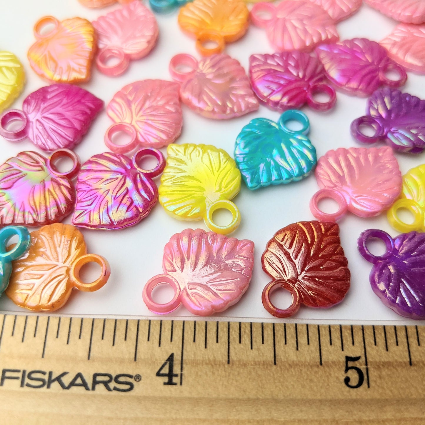 Iridescent Palm Leaves Charms - 100 pieces (41 grams)