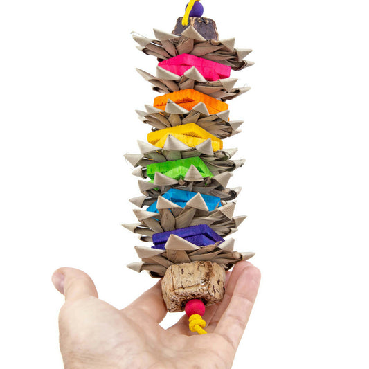 Colorful bird toy with rainbow colored chippers alternating with palm leaf flowers.