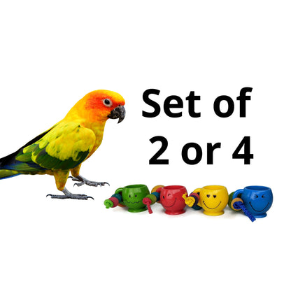 A set of colorful bird toys shown with a jenday conure for scale.