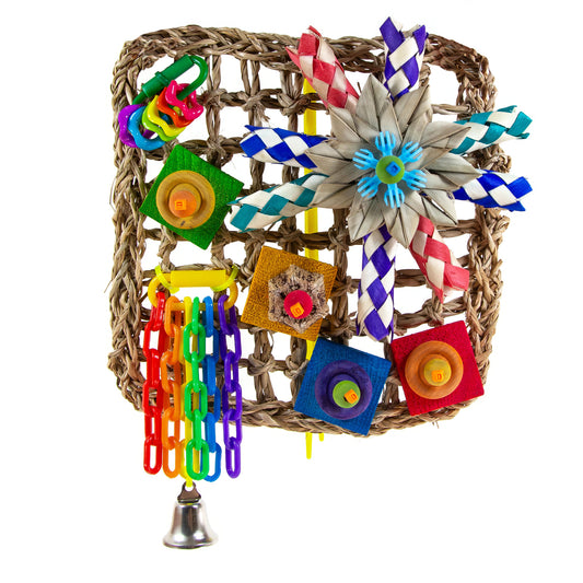 Colorful bird toy with seagrass mat, plastic chains, and wood chew toys attached.