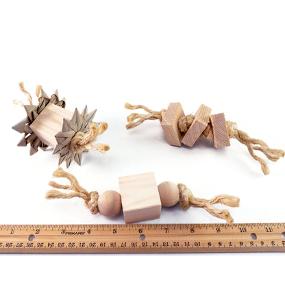 Natural wood blocks strung on untreated sisal with a ruler for scale.